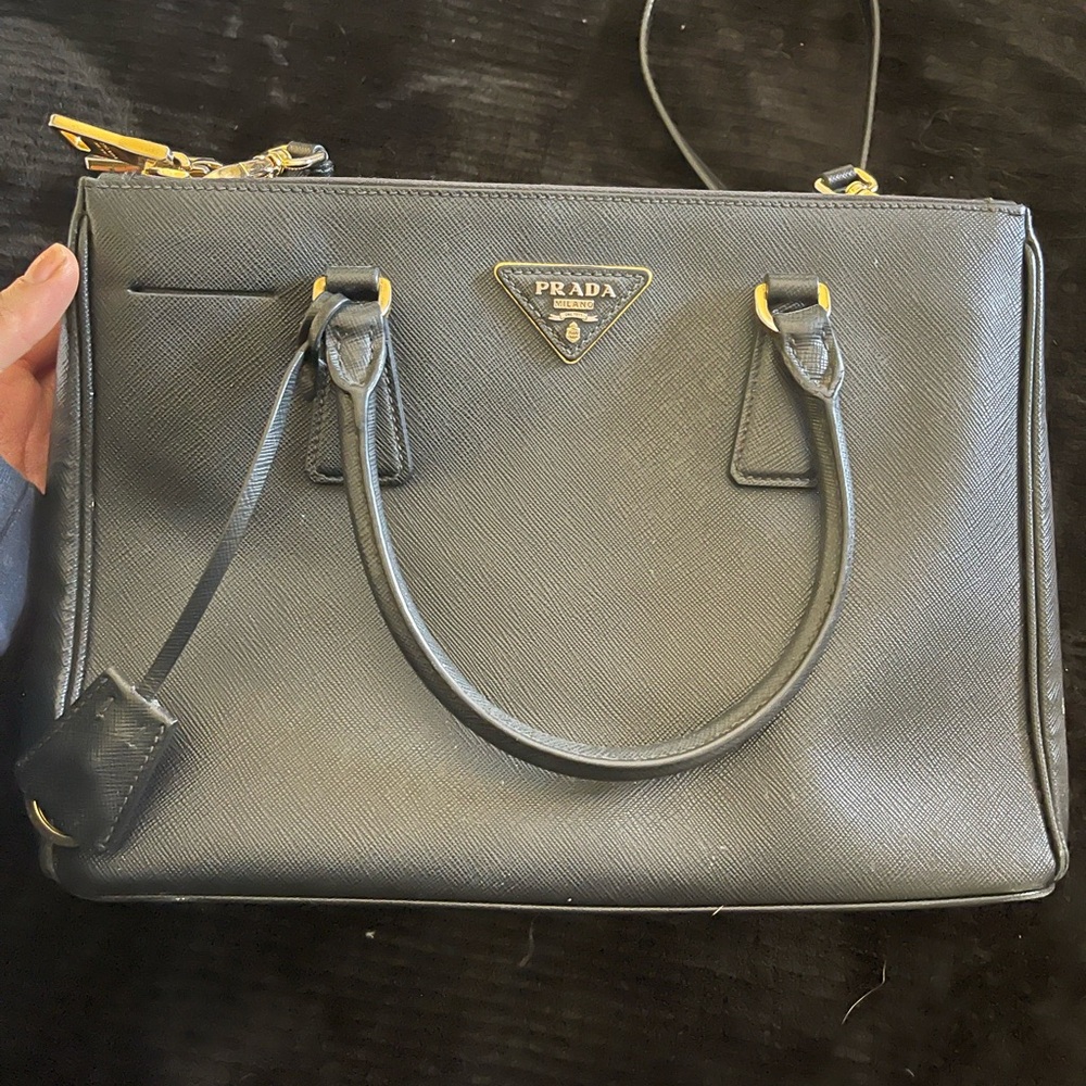 Prada bag. Authentic. Mild wear but good condition. Includes authenticity card.